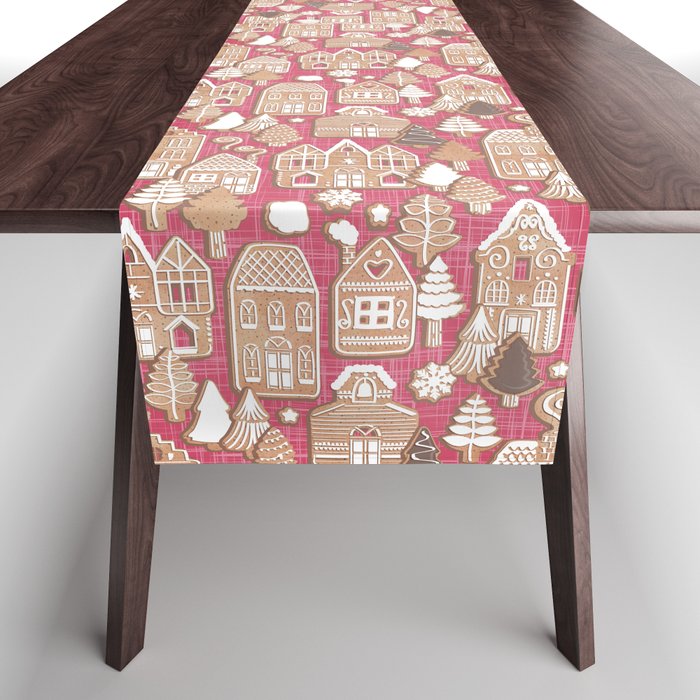 Whimsical Gingerbread Christmas Village // red background white and brown houses and pine trees Table Runner