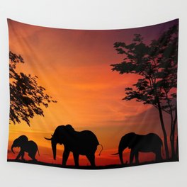 Elephants in the African sunset Wall Tapestry
