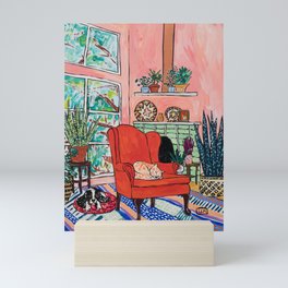 Red Armchair in Pink Interior with Houseplants, Ginger Cat, and Spaniel Interior Painting Mini Art Print