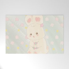 Rabbit playing with flowers Welcome Mat
