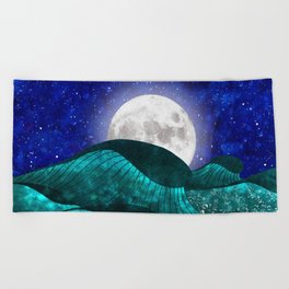 On the ocean at the magical night Beach Towel