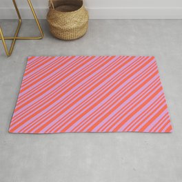 [ Thumbnail: Red and Plum Colored Pattern of Stripes Rug ]
