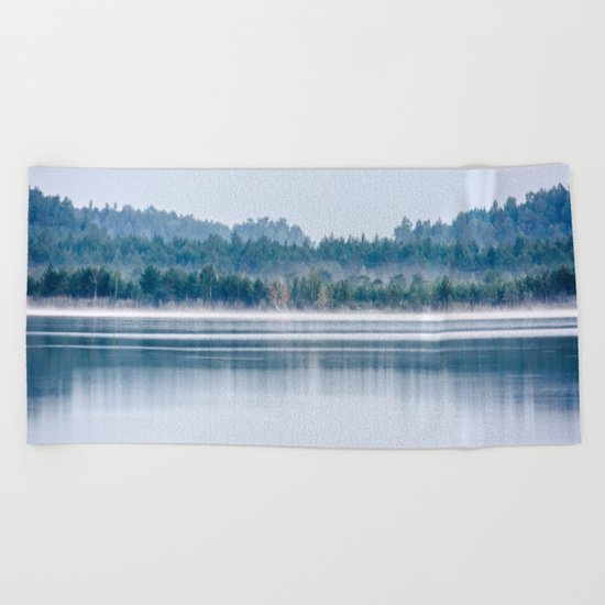 Morning begins with mist Beach Towel