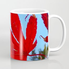 Red Leaf in Focus against the Blue Skies Coffee Mug