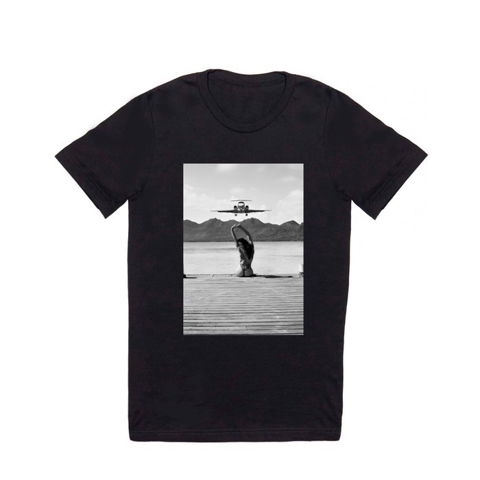 Steady as she goes girl in bikini on a dock with plane landing black and white photograph T Shirt