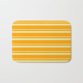 [ Thumbnail: Pale Goldenrod and Orange Colored Lines/Stripes Pattern Bath Mat ]