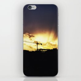 The sun set on construction crane iPhone Skin