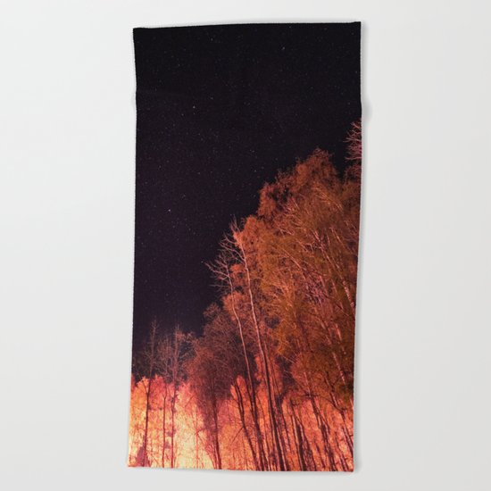 Firey woods Beach Towel