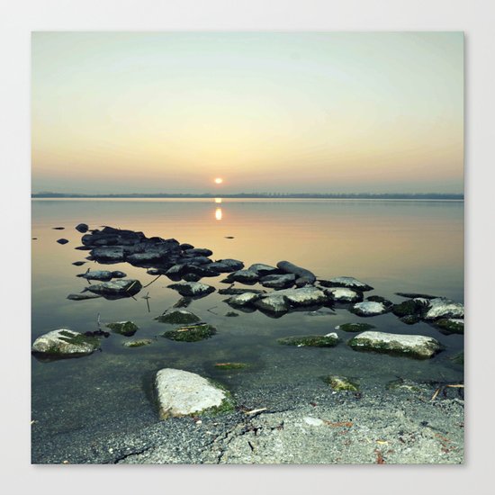 sunset sea stones Canvas Print