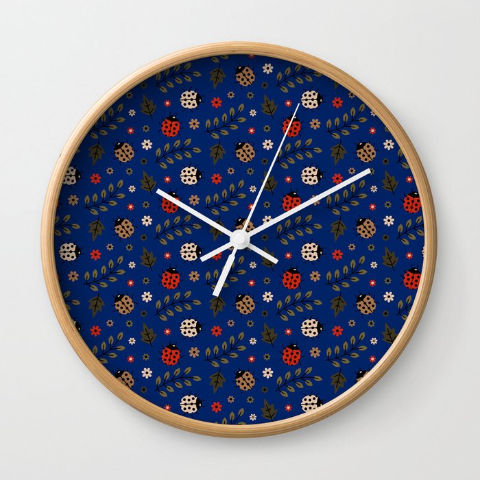 Ladybug and Floral Seamless Pattern on Blue Background Wall Clock