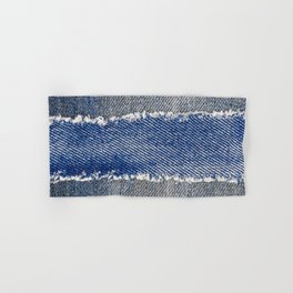 Denim frame. Ripped denim fabric with fringe edge on bleached denim background, text place, copy space. Worn Jeans Casual Double Color patch. Classic blue denim pattern texture  Hand & Bath Towel