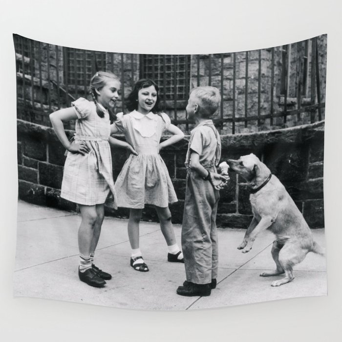 Boys ain't the brightest bulbs in the pack; unsuspecting boy flirting with girls gets his ice cream eaten by smart canine dog funny humorous black and white vintage photograph - photography - photographs Wall Tapestry
