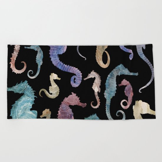 Seahorses at night Beach Towel
