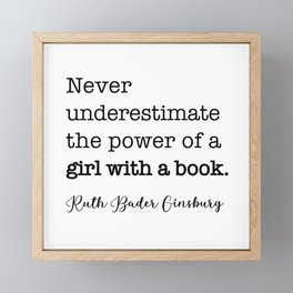 Never underestimate the power of a girl with a book. Framed Mini Art Print