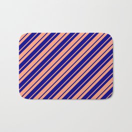 [ Thumbnail: Dark Blue and Light Salmon Colored Lined Pattern Bath Mat ]