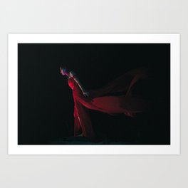 Goddess in the red dress stands in the dark Art Print