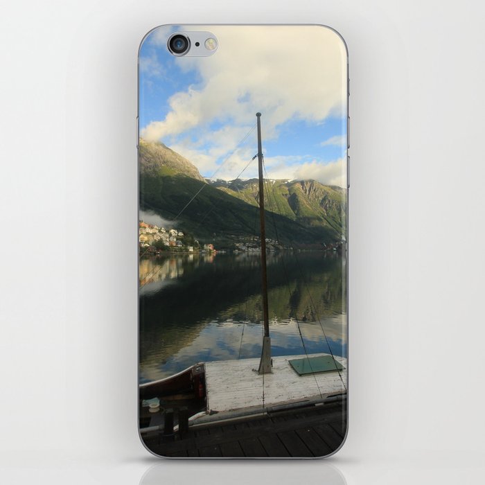 Boat on dock iPhone Skin