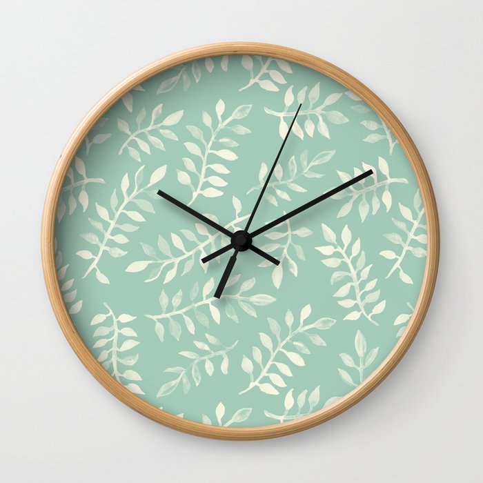 Painted Leaves - a pattern in cream on soft mint green Wall Clock