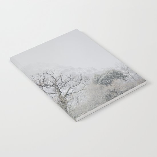 "King of the Mountain". Foggy and snowy mountain. Notebook