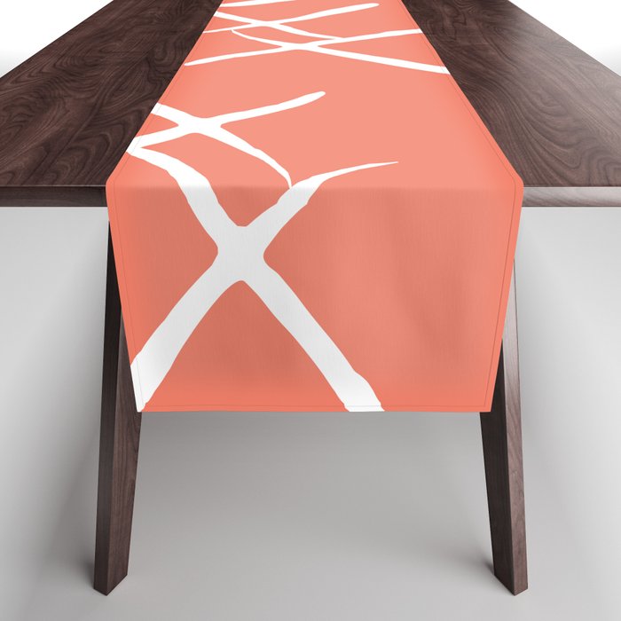 White cross marks on warm background Table Runner