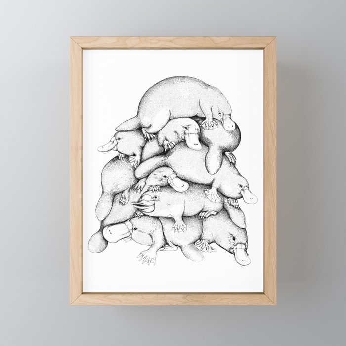 Platypus pile Framed Mini Art Print