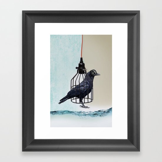 bird in the wire Framed Art Print