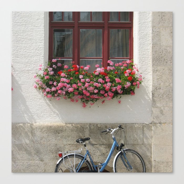 Germany Photography - Bike Parked Under A Flower Filled Window Canvas Print