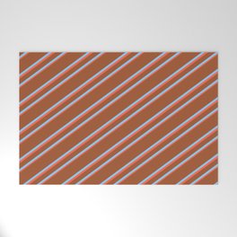 [ Thumbnail: Sienna, Light Sky Blue, and Red Colored Lined Pattern Welcome Mat ]