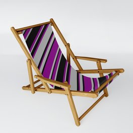 [ Thumbnail: Purple, Dark Gray & Black Colored Striped/Lined Pattern Sling Chair ]