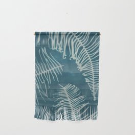 curled ferns on teal Wall Hanging