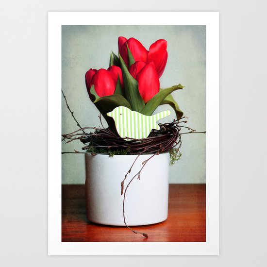 three tulips and a wooden bird Art Print