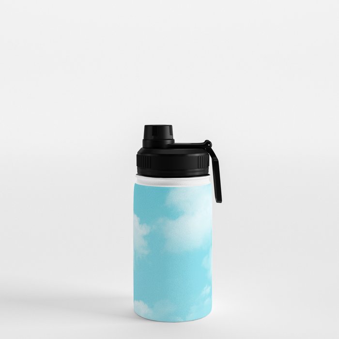 Cute puffy small white clouds on a sunny aqua blue sky Water Bottle