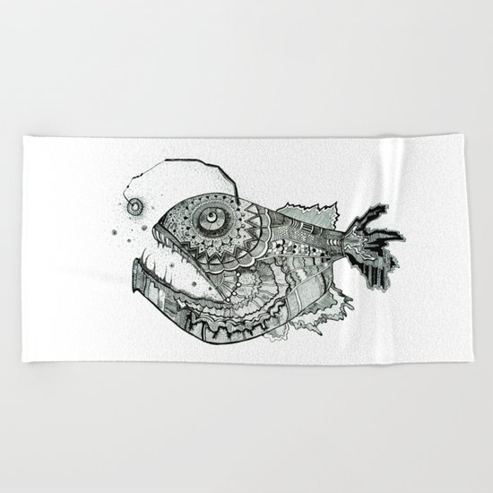 the iron fish Beach Towel