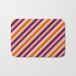 [ Thumbnail: Blue, Light Coral, Tan & Chocolate Colored Lined/Striped Pattern Bath Mat ]