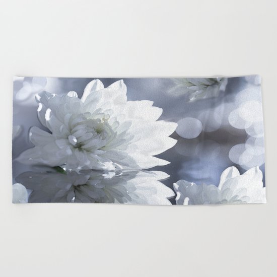 White flower with bokeh on a grey background included wonderful light Beach Towel