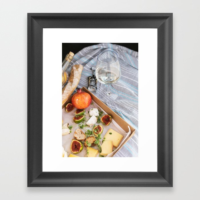 Different delicious food and glass of wine on picnic Framed Art Print