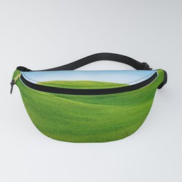 Beautiful spring minimalistic landscape with green hills in Tuscany countryside, Italy Fanny Pack