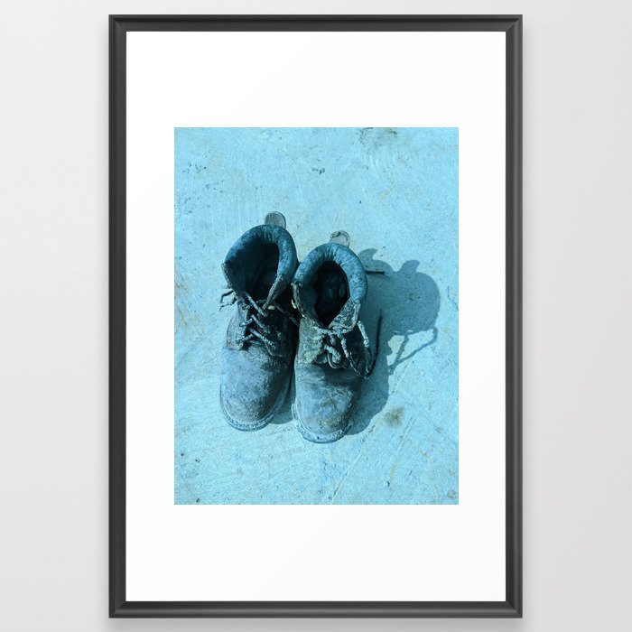 Working boots over concrete floor Framed Art Print