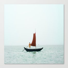 A Man Rowing A Small Boat With a Sail in Bangladesh Canvas Print