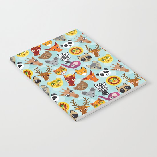 pattern with funny cute animal face on a blue background Notebook