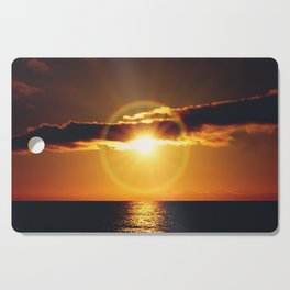Sun halo at sunset over the ocean | Refraction of sunlight behind the clouds | Tenerife Cutting Board