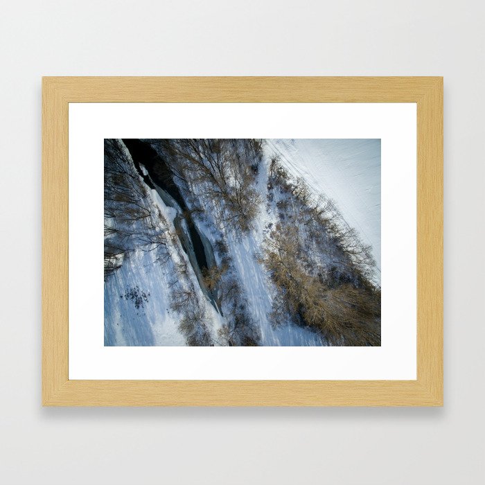 Icy river from above Framed Art Print
