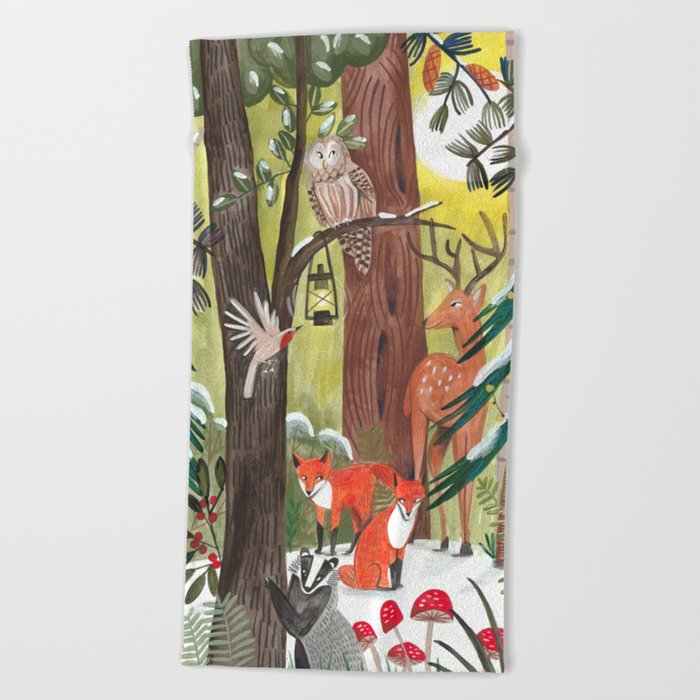 Enchanted forest & woodland animals in the snow Beach Towel