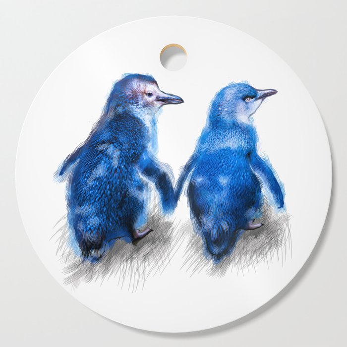 We care a lot. Couple of blue little penguins. Cutting Board
