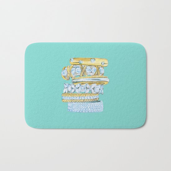 Golden Rings on Blue Bath Mat