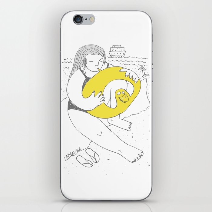 Girl inflating a swim ring iPhone Skin