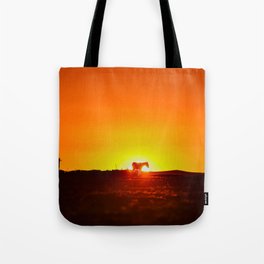 Sunset behind a horse Tote Bag