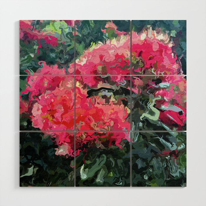 Red flower blossoms amid lush green foliage Wood Wall Art