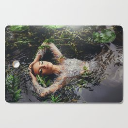 Song of Ophelia singing in the river Denmark; William Shakespeare's Hamlet magical realism female portrait color photograph / photography Cutting Board