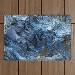 Detail of a rock with variants of blue. Rock full of curves and smooth cuts resulting from the erosive effect of sea. Close up rocks, texture dramatic and colorful erosional water formation. Stone Outdoor Rug